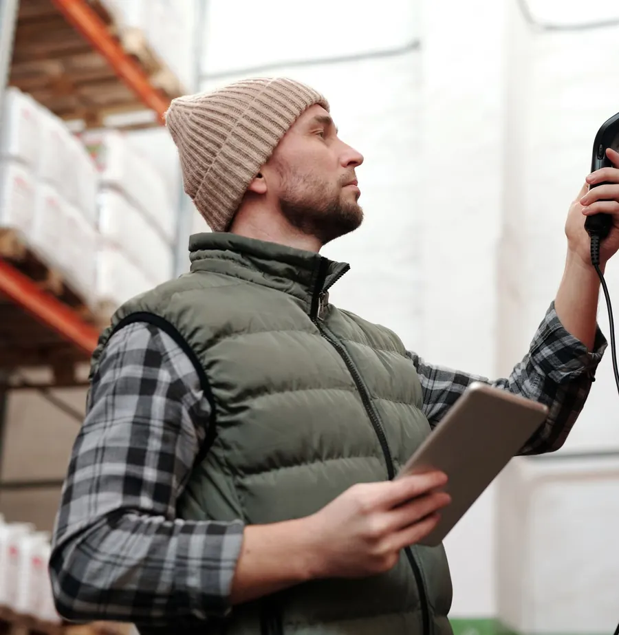 Logistics professional scanning inventory